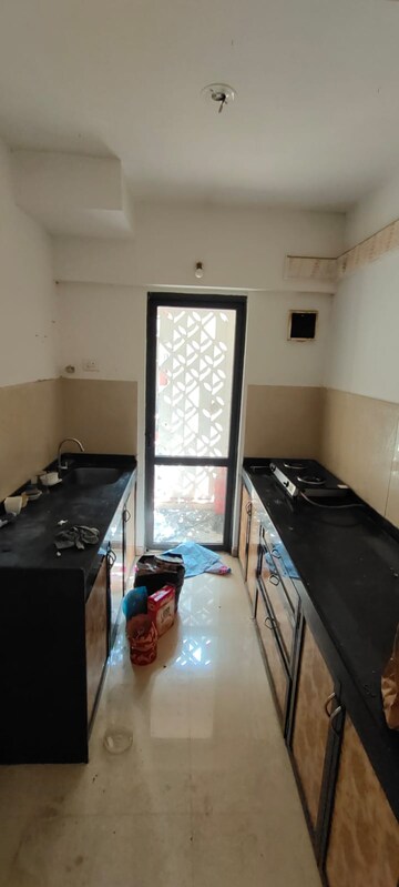Kitchen in 2 BHK Apartment at Lodha Lakeshore Greens, Dombivli East – for Sale