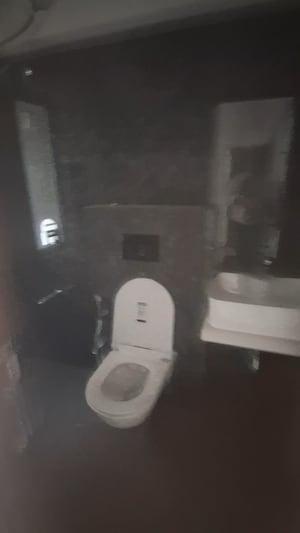 Bathroom in 2 BHK Apartment at Elegant Navratnamala CHS, Santacruz East – for Sale