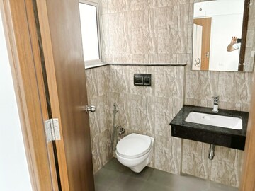 Bathroom in 2 BHK Apartment at Shapoorji Pallonji Joyville Phase 2, Sector 102 – for Rent