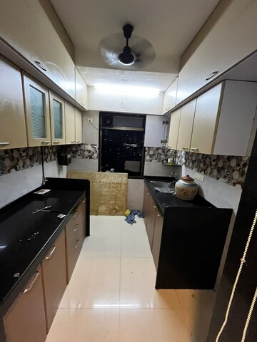 Kitchen in 2 BHK Apartment at Anant Tara, Kandivali West – for Rent