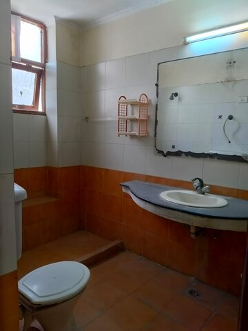 Bathroom in 2 BHK Apartment at RWA Apartments, Sector 31 – for Rent
