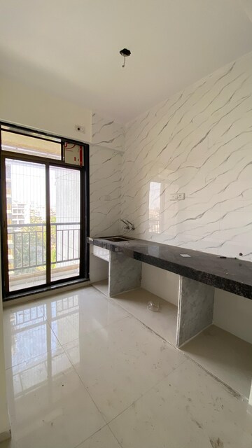 Kitchen in 1 BHK Builder Floor at Shubh Vinayak, Shirgaon – for Sale