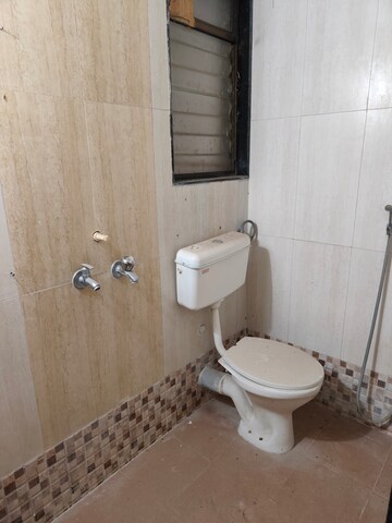 Bathroom in 2 BHK Apartment at Hubtown Greenwoods, Vartak Nagar – for Rent