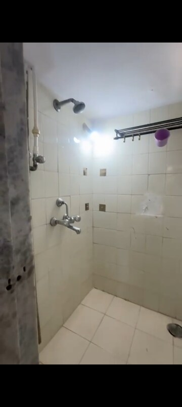 Bathroom in 1 BHK Apartment at Kanakia Sanskruti, Kandivali East – for Rent