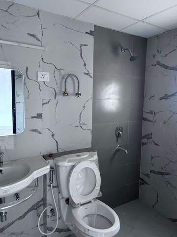 Bathroom in 3 BHK Apartment at Purvanchal Royal City II, Chi V Greater Noida – for Rent