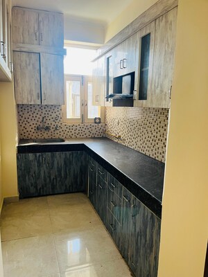 Kitchen in 3.5 BHK Apartment at Gulmohur Garden, Raj Nagar Extension – for Sale
