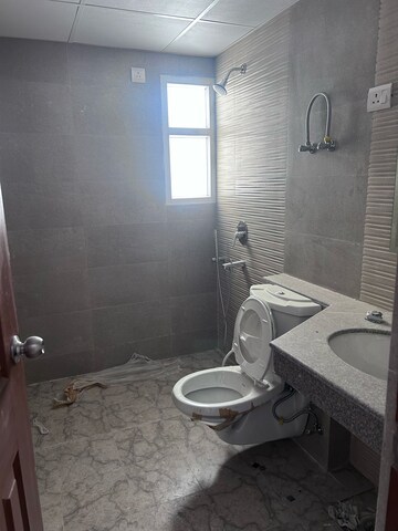 Bathroom in 3 BHK Apartment at Purvanchal Royal City II, Chi V Greater Noida – for Rent
