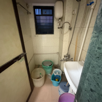 Bathroom in 1 BHK Apartment at Rupji Vrindavan, Tilak Nagar – for Rent