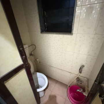 Bathroom in 1 BHK Apartment at Rupji Vrindavan, Tilak Nagar – for Rent