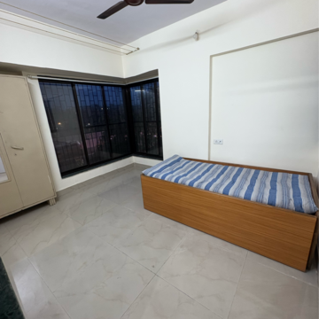 Bedroom in 1 BHK Apartment at Rupji Vrindavan, Tilak Nagar – for Rent