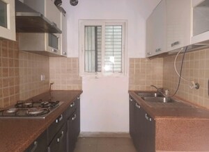 Kitchen in 2 BHK Apartment at Mahagun Moderne, Sector 78 – for Sale