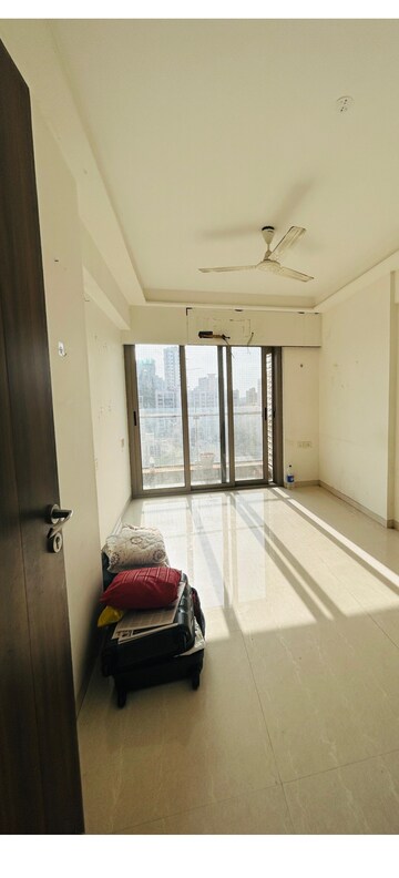 Living Room in 2 BHK Apartment at Adani Group Western Heights, Andheri West – for Rent