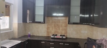 Kitchen in 3.5 BHK Apartment at Aims Golf City, Sector 75 – for Rent