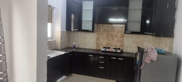 Kitchen in 3.5 BHK Apartment at Aims Golf City, Sector 75 – for Rent