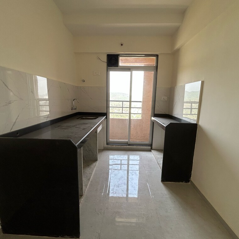 Kitchen, damji-shamji-mahavir-kalpavruksha-wing-j-phase-2 2 Bedroom 684 Sq.Ft. Apartment In Anand Nagar Thane 8616897