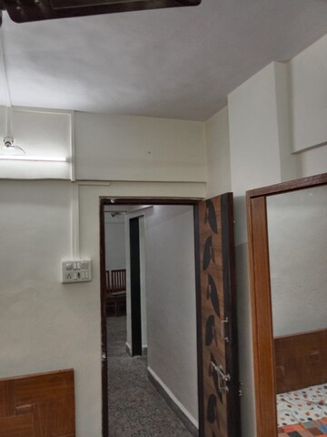 Kitchen in 2 BHK Apartment at Ani Anu Sri Balaji Enclave, Malad West – for Sale
