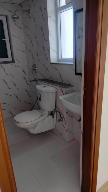Bathroom in 3 BHK Apartment at Adani Oyster Grande Phase 2, Sector 102 – for Rent