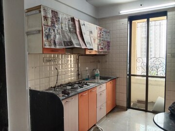 Kitchen in 2 BHK Apartment at Lake Pleasant, Powai – for Rent