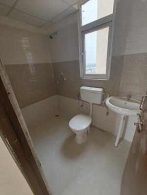Bathroom in 2 BHK Apartment at Signature Global Orchard Avenue, Sector 93 – for Sale