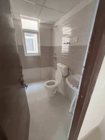 Bathroom in 2 BHK Apartment at Signature Global Orchard Avenue, Sector 93 – for Sale