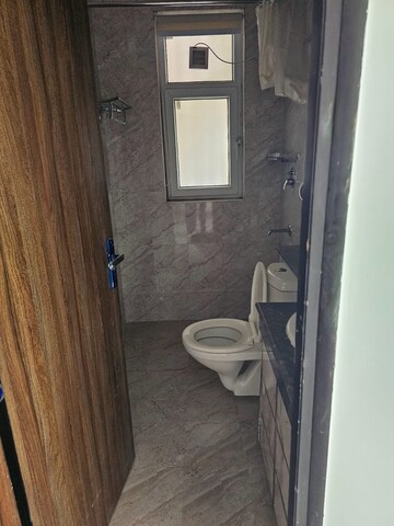 Bathroom in 2.5 BHK Apartment at Raheja Atharva, Sector 109 – for Rent