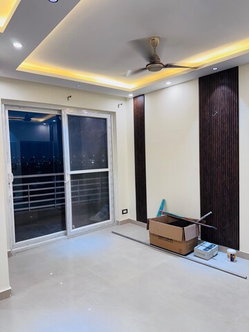 Living Room in 2.5 BHK Apartment at Raheja Atharva, Sector 109 – for Rent