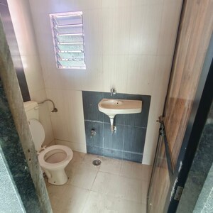 Bathroom in 2 BHK Apartment at Triveni Bhoomi Harmony, Kamothe Sector 18 – for Sale