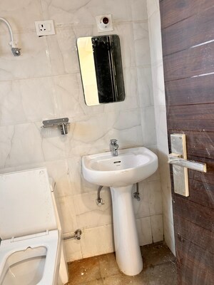 Bathroom in 1 BHK Apartment at Nilaya Greens, Raj Nagar Extension – for Sale