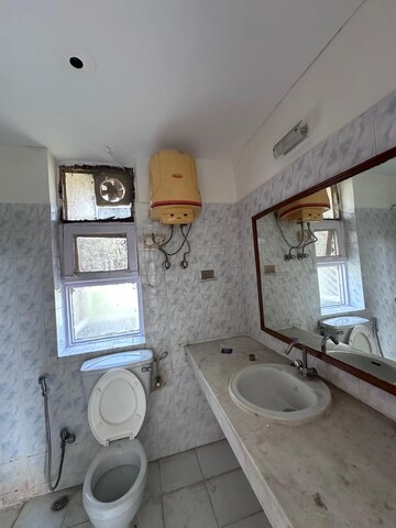 Bathroom in 3 BHK Builder Floor at Ansal Sushant Apartments, Sushant Lok I – for Rent