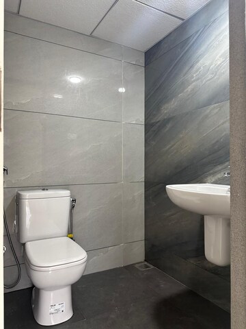 Bathroom in 2 BHK Apartment at Kumar Palmspring Towers, Undri – for Rent