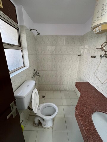 Bathroom in 3 BHK Builder Floor at Ansal Sushant Apartments, Sushant Lok I – for Rent