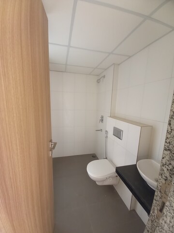 Bathroom in 1 BHK Apartment at Godrej Nirvaan, Themghar – for Rent