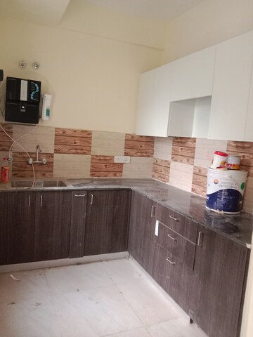 Kitchen in 2 BHK Apartment at Amrapali Dream Valley, Tech Zone 4 Greater Noida – for Rent