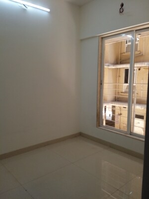 Room in 1.5 BHK Apartment at Andheri West – for Sale