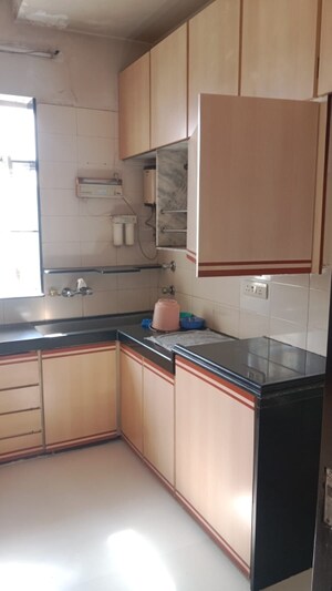 Kitchen in 1 BHK Apartment at Bhaskar Smruti, Grant Road – for Sale