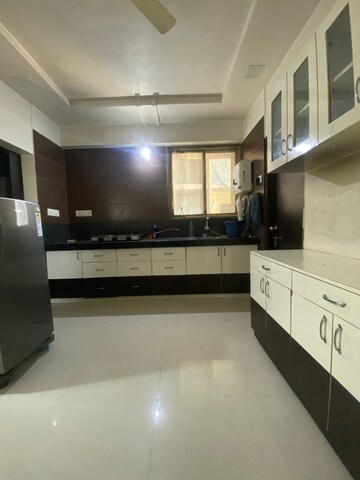 Kitchen in 2 BHK Apartment at Ratnaakar Richmond Grand, Makarba – for Rent