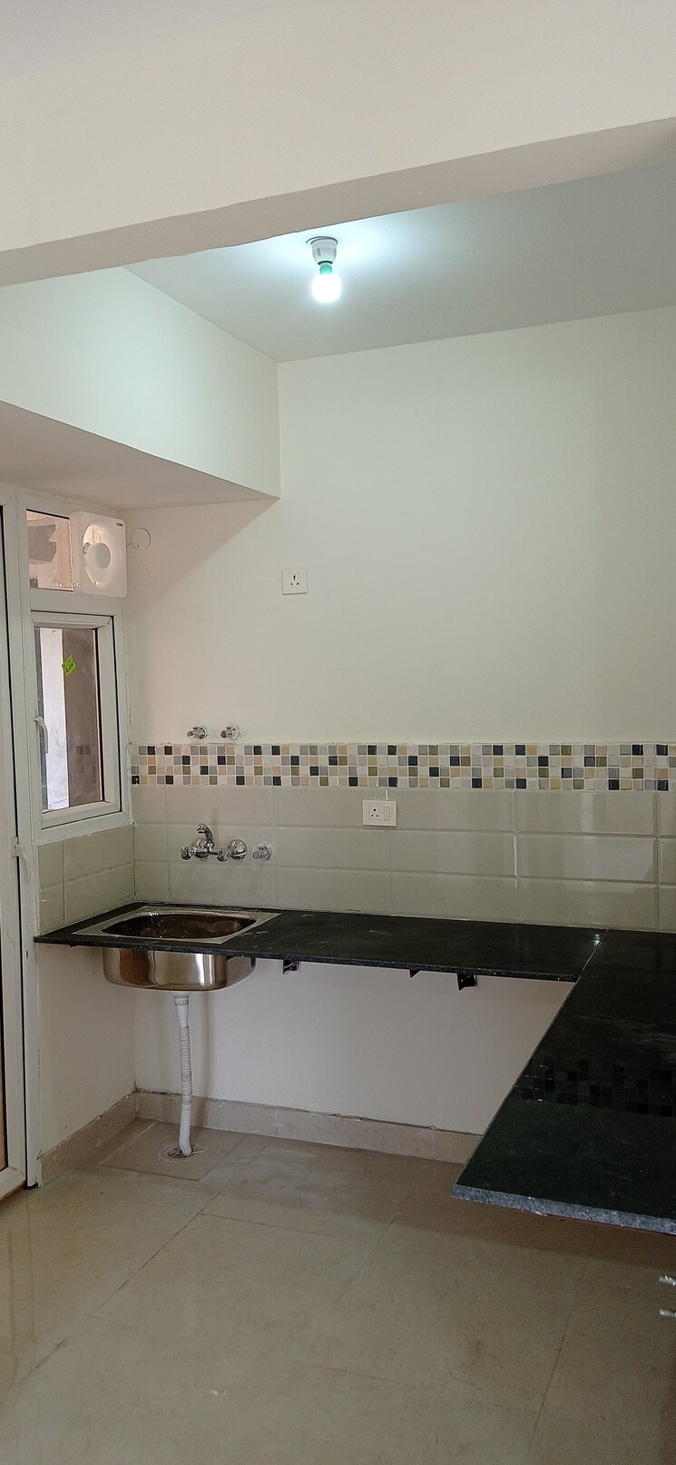 Kitchen, signature-global-the-millennia 2 Bedroom 596 Sq.Ft. Apartment In Sector 37d Gurgaon 8618222