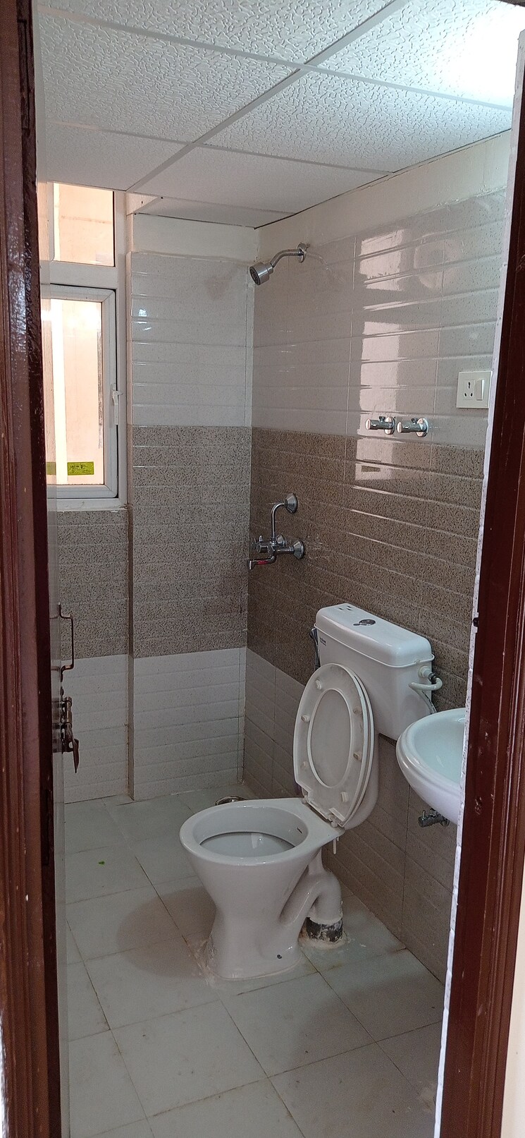 Bathroom, signature-global-the-millennia 2 Bedroom 596 Sq.Ft. Apartment In Sector 37d Gurgaon 8618222