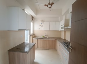 Kitchen in 2 BHK Apartment at Puri Emerald Bay, Sector 104 – for Sale