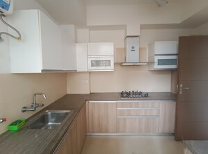 Kitchen in 2 BHK Apartment at Puri Emerald Bay, Sector 104 – for Sale