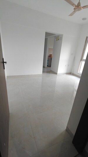 Living Room in 1 BHK Apartment at Trishabh Greens, Chembur – for Sale