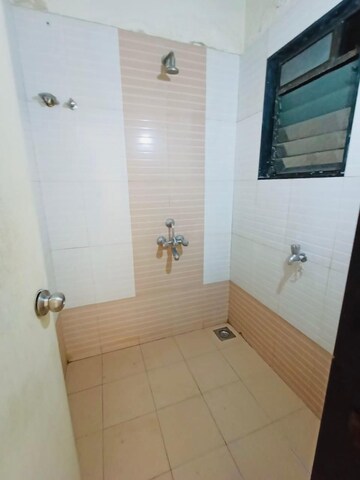 Bathroom in 1 BHK Apartment at Hyde Park CHS, Kharghar – for Rent