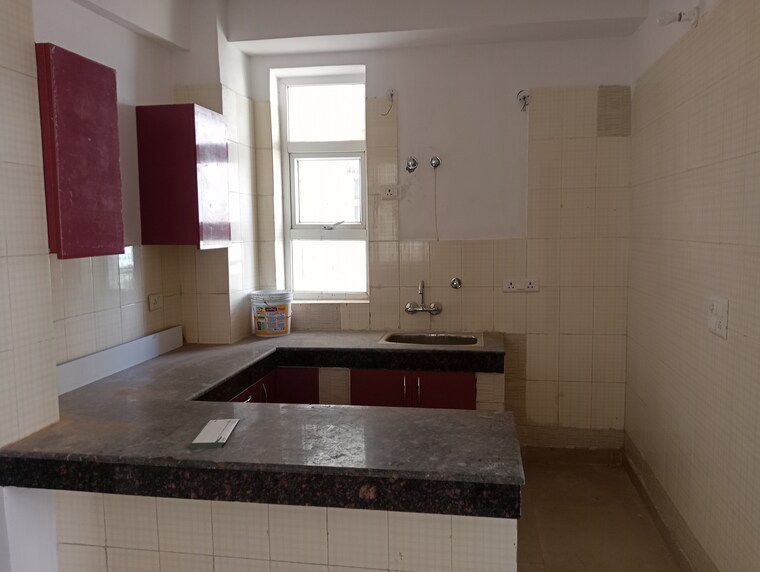 Kitchen, divine-meadows 2.5 Bedroom 1227 Sq.Ft. Apartment In Sector 108 Noida 8618370