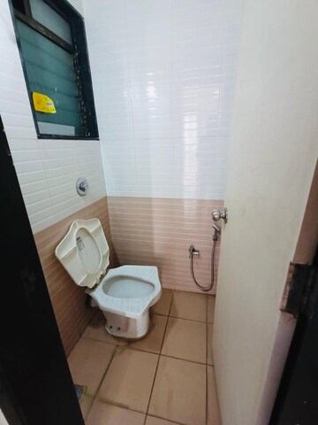 Bathroom in 1 BHK Apartment at Hyde Park CHS, Kharghar – for Rent