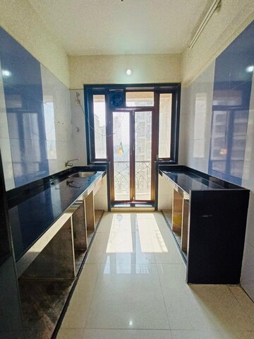 Kitchen in 1 BHK Apartment at Hyde Park CHS, Kharghar – for Rent
