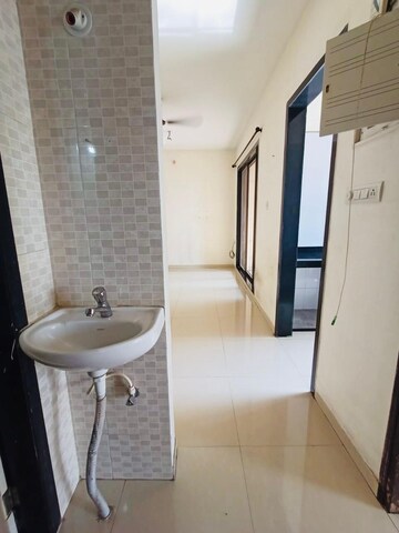 Living Room in 1 BHK Apartment at Hyde Park CHS, Kharghar – for Rent