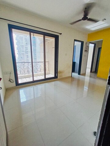 Living Room in 1 BHK Apartment at Hyde Park CHS, Kharghar – for Rent