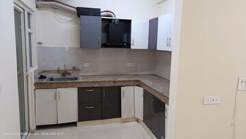 Kitchen in 3 BHK Apartment at Savfab Jasmine Grove, Delhi Meerut Expressway – for Sale