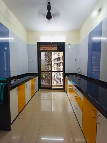 Kitchen in 2 BHK Apartment at Hyde Park CHS, Kharghar – for Rent