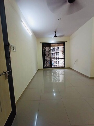 Living Room in 2 BHK Apartment at Hyde Park CHS, Kharghar – for Rent